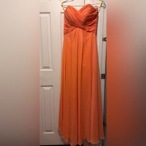 Elegant flowy orange strapless dress for all occasions